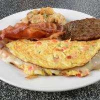 3. Western Omelette · Ham, peppers and onions. Made with 3 eggs and served with home fries and toast.