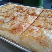 12 Spinach Pie Tray, 4.5x4.5 inches per slice · Spinach, onion and feta cheese wrapped in phyllo dough.
there is a 5 dollar deposit fee for ...