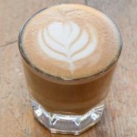 Cortado  · 2 shots of rich, bold espresso and 2 oz of steamed milk of choice in an 8 oz cup