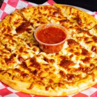 Italian Dunkers · Our classic crust with garlic butter sauce topped with mozzarella and served with marinara s...