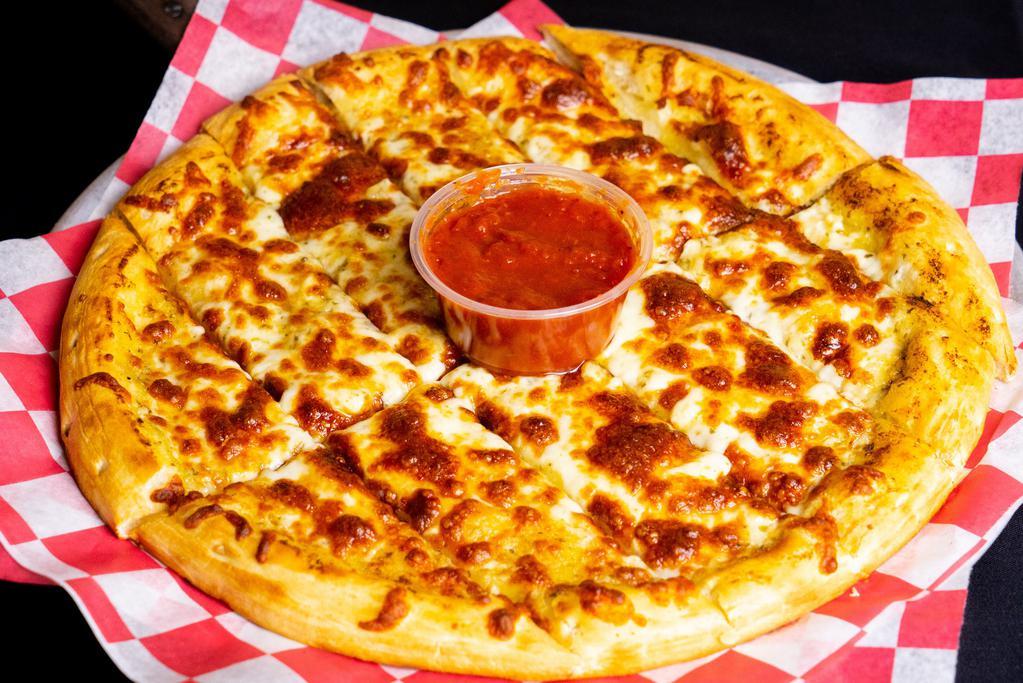 Italian Dunkers · Our classic crust with garlic butter sauce topped with mozzarella and served with marinara sauce for dipping.