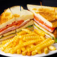 Clubhouse Sandwich · Ham, turkey, Swiss cheese, Cheddar cheese, bacon, lettuce, tomato and mayo on toasted sourdo...