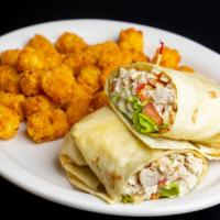 Chicken Caesar Wrap · Romaine lettuce, grilled chicken breast, tomato and shaved Parmesan tossed in creamy Caesar ...