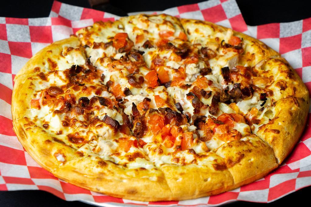 Chicken Bacon Ranch · Ranch dressing, chicken breast, bacon, tomatoes, onions and mozzarella cheese.