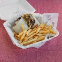 Gyro Philly Wrap · 100% lamb gyro meat, banana peppers, and onions with American cheese, mayo in a wrap, and fr...