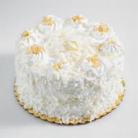 White Chocolate Macadamia Mousse Cake · Contains nuts.