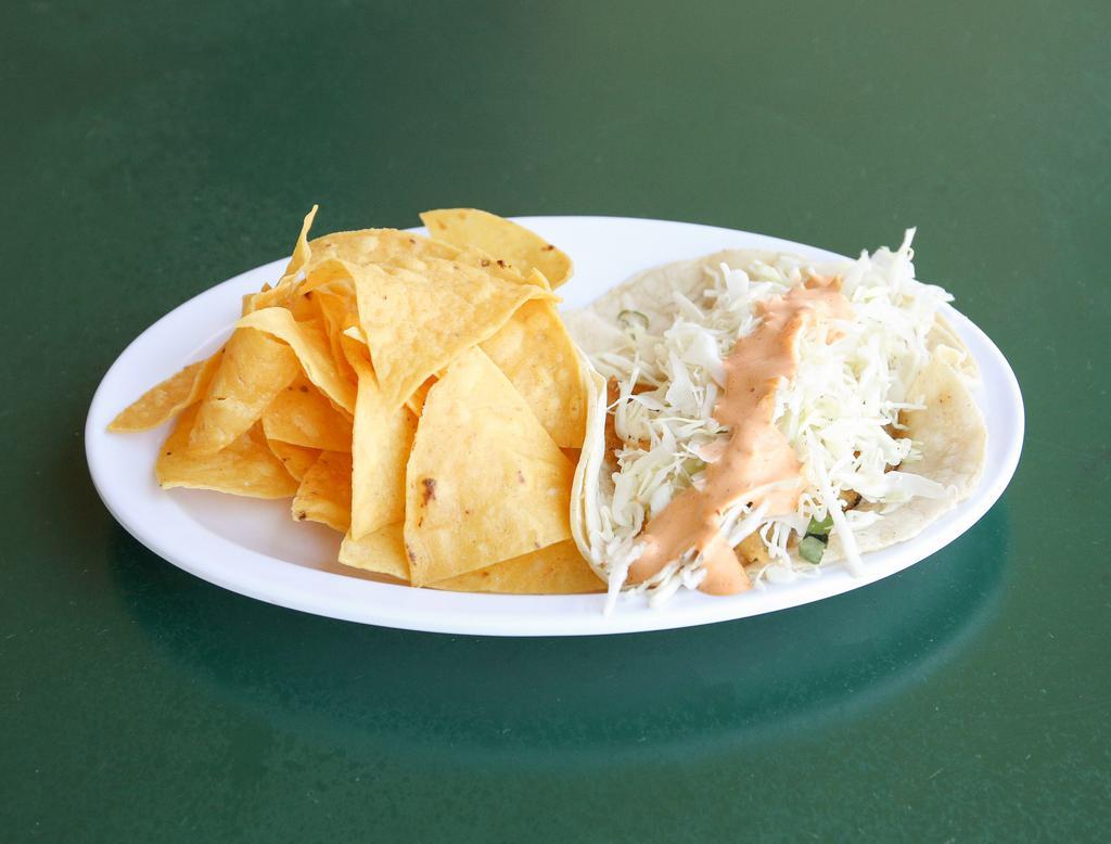 San Lucas Fish Taco · Our famous grilled fish taco served in soft corn tortillas with cabbage mix and chipotle sauce.