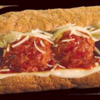 Regular Meatball Parmigiana · Italian beef/pork blended meatballs smothered in a zesty marinara sauce with melted provolon...