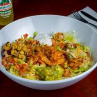 Chicken Baja Bowl · Served over rice, pico de gallo, lettuce, sour cream, guacamole, and corn salsa topped with ...