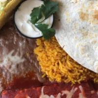 Mexicana · One quesadilla, one enchilada, and a soft taco, choice of beef, chicken, or steak.  Served w...