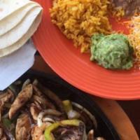 Shrimp ＆ Chicken Fajitas · Served with tortillas, rice and beans, guacamole, sour cream and cheese.