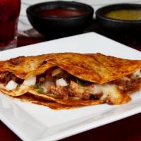Jalisco · Large flour tortilla stuffed with cheese, pastor (marinated pork), onion, cilantro & red sal...