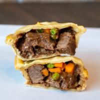 The Beef Jason Pie · Chunky beef and garden vegetables.
