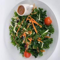 Kale Salad · Kale,Cabbage,Dried Cranberries ,Carrot,Tomatoes and Almond Slices.