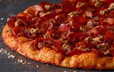 Ulti-Meat Pizza · Primo pepperoni, linguiça, bacon, Italian sausage on zesty red sauce.