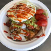Buddha Tot Breakfast Bowl · Tater tots, 1 egg with hatch green chile, cheese, avocado spread and sriracha. 
