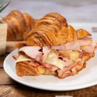 Ham & Swiss Breakfast Croissant · Black Forest Ham and Swiss Cheese on Croissant. 