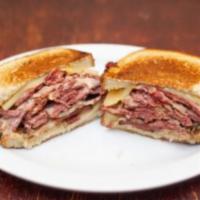 Combo Rueben Specialty · Pastrami and corned beef, Swiss cheese, sauerkraut, and Russian dressing on rye. Add french ...