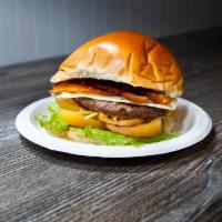 X-Burger · 100% beef patty, cheese, lettuce, tomato, sweet corn, potato sticks and mayo.