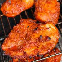 Chicken Suya · Our chicken suya is a tender cut of chicken, marinated in suya spice rub; prepared on a smok...