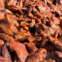 Beef Suya · Our beef suya is tender cuts of black Angus halal, USDA choice beef, marinated in suya spice...