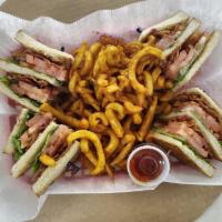 BLT Club Sandwich · Thick smoked bacon strips, lettuce and tomatoes on toasted bread.