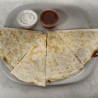 Quesadillas · Mozzarella cheese melted between a flour tortilla served with salsa and sour cream. Add tend...