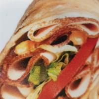 Buffalo Chicken Wrap · Sliced buffalo chicken breast, provolone, tomatoes, lettuce and onion with Frank's ® RedHot ...