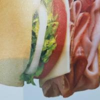 Blimpe Best · Slow-cured ham, salami, capicola, prosciuttini, provolone, made the BLIMPIE® WAY with tomato...