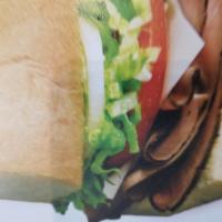 Roast Beef and Provolone · Thinly sliced, top-round roast beef and provolone made the BLIMPIE® WAY with tomatoes, lettu...