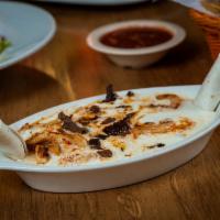 Large Laredo's Premium Dip · A selection of grilled steak, chicken and shrimp with queso dip.