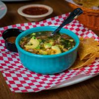 Chicken Soup · A hearty, full of flavor chicken soup with avocado, tomatoes, onions, rice cilantro, a touch...