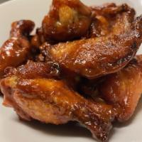 Wings · Miller Farm amish chicken wings served with mild or hot sauce, ranch or blue cheese with cel...