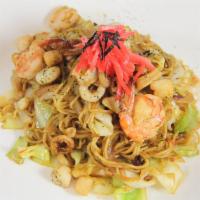 Seafood Yaki Soba · Stir-fried soba noodle with seafood (shrimp, calamari, and bay scallop) and vegetables (gree...