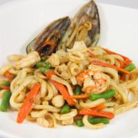 Seafood Pasta with Udon Noodle · Stir-fried thick udon noodle with seafood (shrimp, calamari, bay scallop, and mussel) and ve...