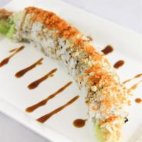 Shrimp Tempura Roll · Shrimp tempura, crab meat, avocado, cucumber roll topped with tempura crunchy with house eel...
