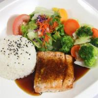 Lunch Salmon Teriyaki · Oven-baked salmon glazed with house-made teriyaki sauce comes with steamed vegetables (green...