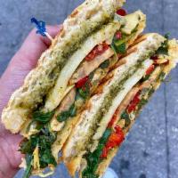 Tuscan Veggie Panini · Artichoke hearts, sun-dried tomatoes, mushrooms, spinach, roasted red peppers, and provolone...