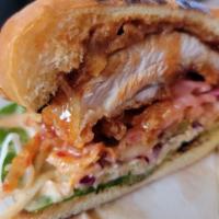 Crispy Chicken Sandwich · Crispy chicken with pickled red onions and QP mayo.