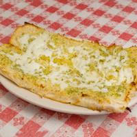 Garlic Bread · Sorento's bread baked with our house made garlic butter and lightly sprinkled with mozzarell...