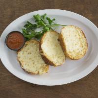 Garlic Cheese Bread · Delicious Garlic cheese bread! Served with a side of Marinara sauce.