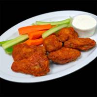 Hot Wings · 6 Crispy chicken wings , with your choice of Ranch or BBQ side sauce , accompanied with fres...