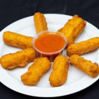 Mozzarella Sticks · Strips of mozzarella cheese breaded and fried served with marinara sauce.