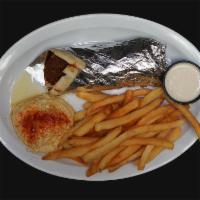 Falafel Sandwich · Salad, French Fries and Tahini Sauce.