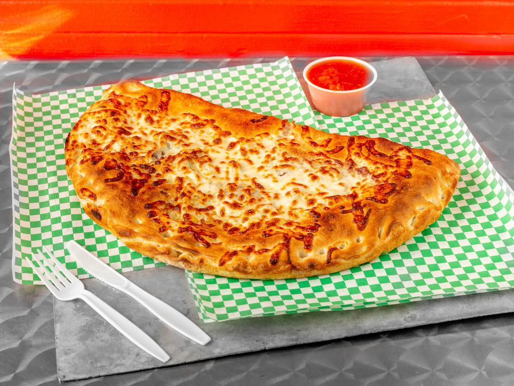 5. Steak Bomb Calzone · Calzones are round whole pan. Topped with blend of cheddar and mozzarella.