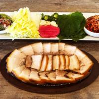 Pork Belly Wrap Specialty · Pork Belly boiled with Chines herb house special sauce. Comes with all kinds of vegetable wr...