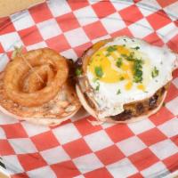 Farmhouse Burger · Canadian bacon, sunny-side up egg and melted cheese blend on a toasted English with side chi...