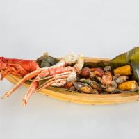 Large Seafood Boat · Serves 8 - 10 persons. Comes with your choice of one of the following: 1.5 lbs of King Crab ...