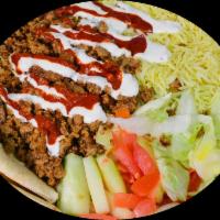 Halal Lamb And Beef Over Rice With Side Salad · Halal lamb and beef over rice with side salad and choice of sauce. New York Style