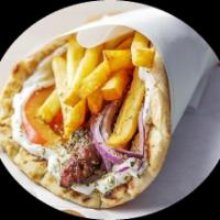 Pork Souvlaki Platter · Marinated Pork, Seasoned Fries, Fresh Greek Salad
